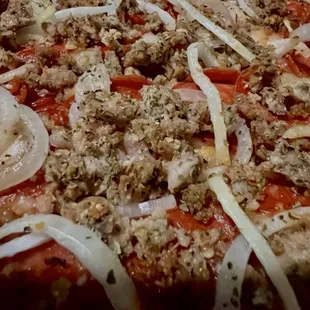Close up of our Sausage, Pepperoni &amp; onion pizza.