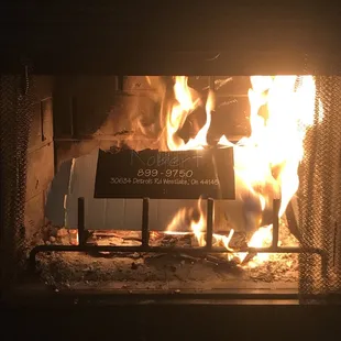 a fire in a pizza oven