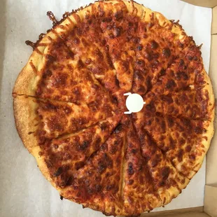 Burnt pizza delivered 45 minutes after it was expected.