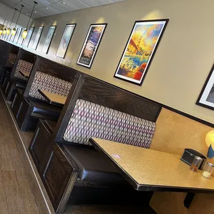 a long row of booths in a restaurant