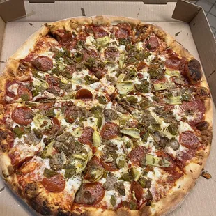 a pizza in a pizza box