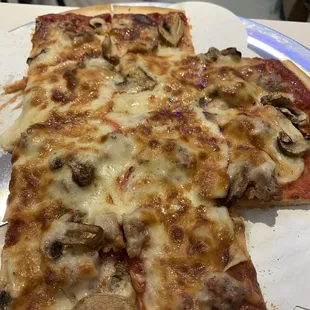 Sausage and mushroom pizza thin crust.  Very good