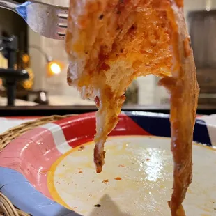 Virtually no sauce but lots of grease.