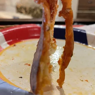 Pizza so crisp when picked up by a fork it bends in half.