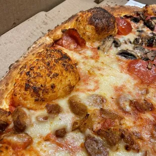 a slice of pizza in a box