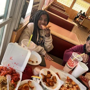 Bomb Pepperoni and sausage pizza,hot wings,and fried rice with sweet and sour chicken GO GETCHU SOME!!!!!!!