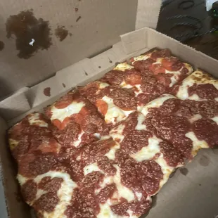 Half cheese half pepperoni deep dish with extra sauce