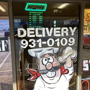 close-up view of front window of restaurant (unsure why Saturday's hours of operation aren't listed on window sign)