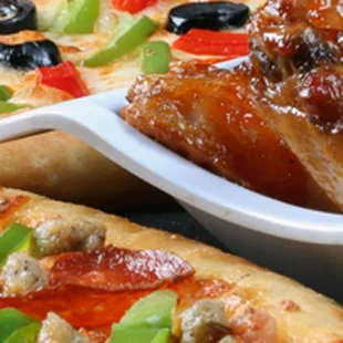 two pizzas with different toppings