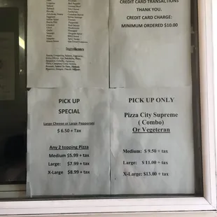 menus and prices on a window