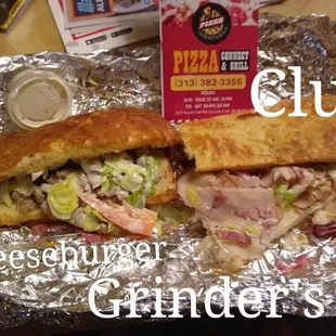 a club sandwich on tin foil