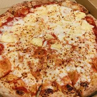 Pizza Corner cheese pizza and half pineapple - the cheese pull was amazing