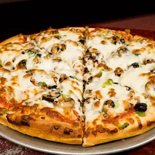 a pizza with cheese and olives