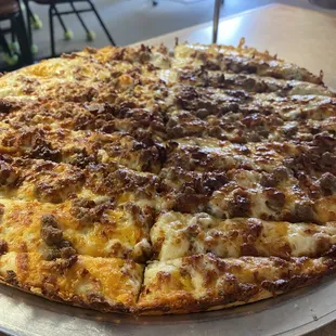 Loaded cheese bread with bacon and sausage