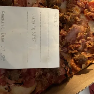 Meat Lovers Pizza from Pizza Crossing and bill.