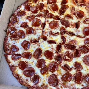 Pepperoni Pizza - Solid pie! Love the cupping pepperoni but usually like regular triangle slices. Would get again...