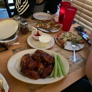 Barbecue wings, mini pizzas