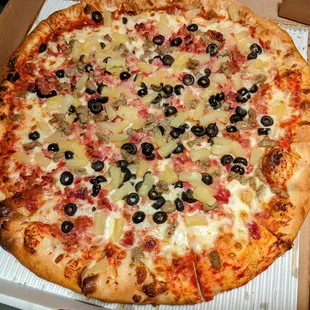 I added black olives to my usual (extra pineapples, pepperoni, sausage). Nice.