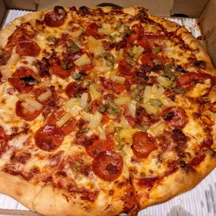 I cannot get over the lovely, chewy crust. As always, I loaded it with pineapple chunks (more pineapples please), pepperoni, and sausage.