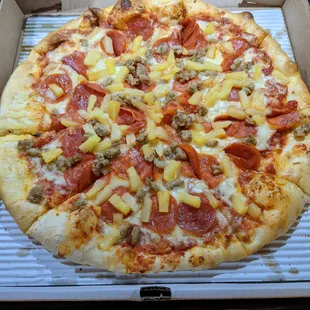 Double pineapple, yet still not enough - with pepperoni and sausage.