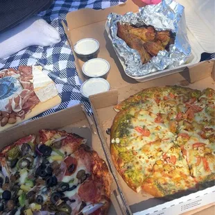 Deluxe Pizza, chicken pesto pizza , lemon pepper wings