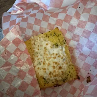 With my Pasta, it came with its cheesy bread on the side
