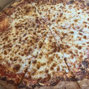 Cheese Pizza I highly recommend this spot . The cheese was fresh , sauce was richly flavored and crispy airy texture .