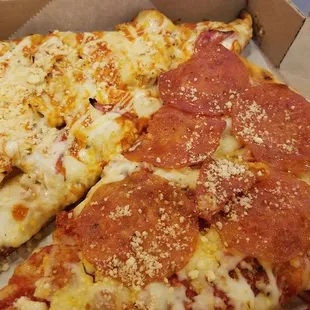 Slice of pepperoni, and a slice of buffalo chicken