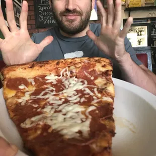 Their &quot;giant slice&quot; its huge. Equivalent to about 4 regular slices.
