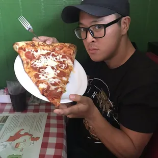 Giant pizza slice (with the salad and drink combo for $7.25)