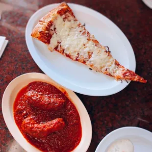 1/2 slice of cheese pizza / $3.25 + Sausage links / $2 each