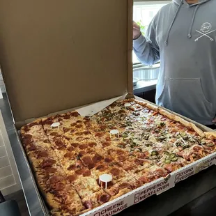 Their huge pizza that feeds a community! Awesome!