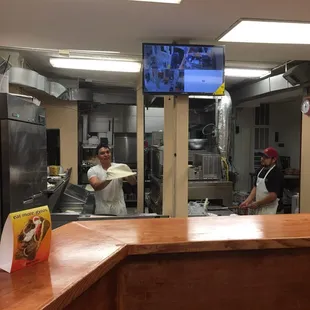 These guys are apparently the real deal. I can't remember the last time I saw a person flipping dough to make my pizza.