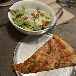 Caesar salad and meat pizza