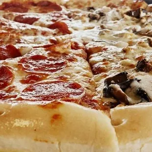 a pepperoni and mushroom pizza