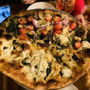 a pizza with vegetables and cheese