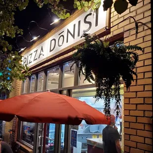outside of a restaurant at night