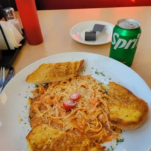 The Shrimp Fettuccine with Lobster Cream Sauce, which includes Garlic Bread.