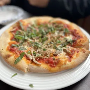 a plate with a pizza on it