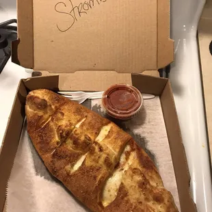In case anyone wanted to see the difference! Stromboli had more pepperoni and calzone had more cheeses.
