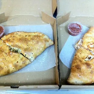 two slices of pizza in a box