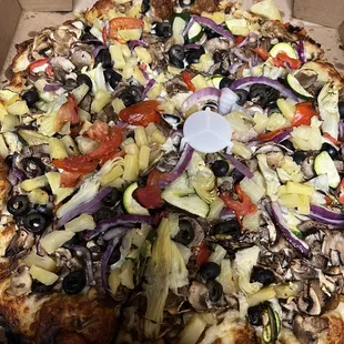 a pizza in a cardboard box