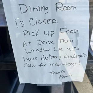 a sign on the door of a restaurant