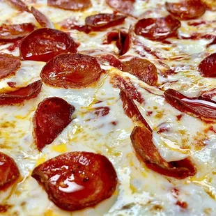 a pepperoni and cheese pizza