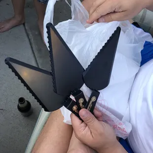 a man cutting a piece of paper