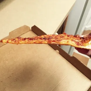 Another picture. Was not supposed to be thin crust. Barely any sauce.