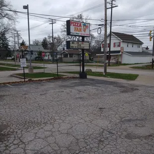 an empty parking lot in a small town