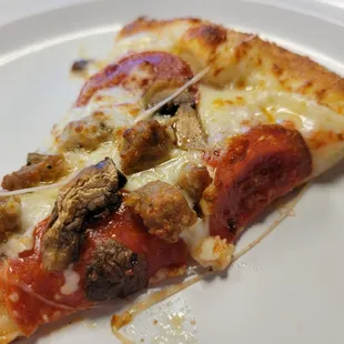 I have found my happy pizza place! Generous toppings, lots of cheese, tasty, tender crust.