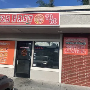 the front entrance of a restaurant