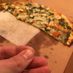 There was a STAPLE in my pizza!!! Ouch!!